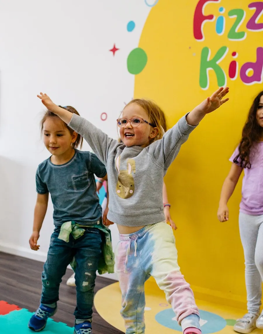 Children enjoying a Preschool Program craft activity