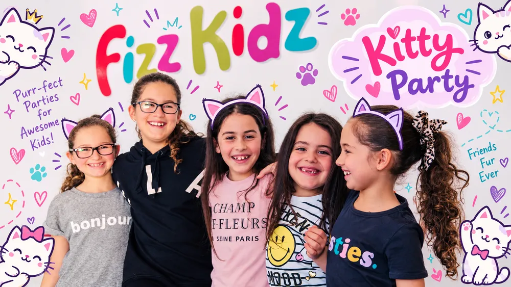 girls at fizz kidz smiling