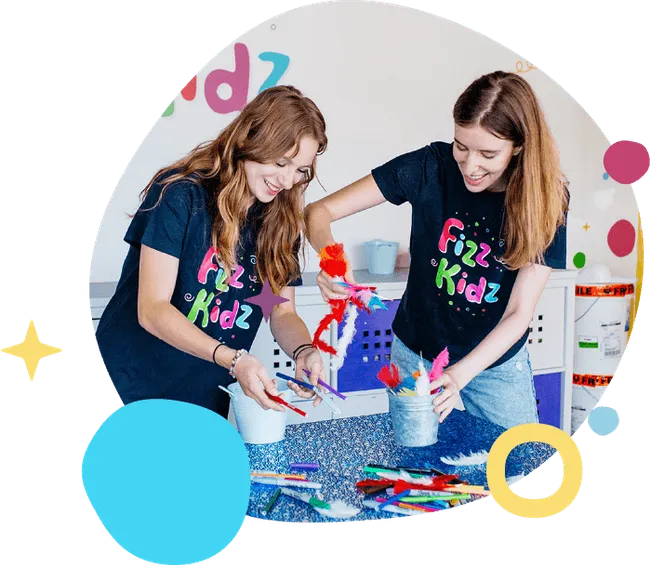 Fizz Kidz staff leading a creative activity