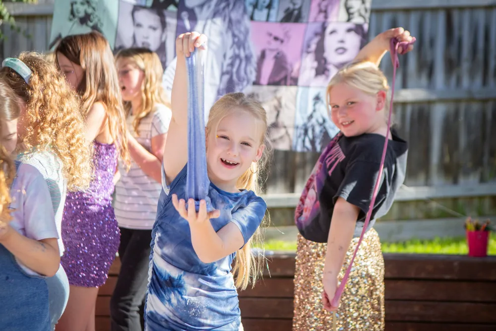 Kids making creations at a Fizz Kidz at home party
