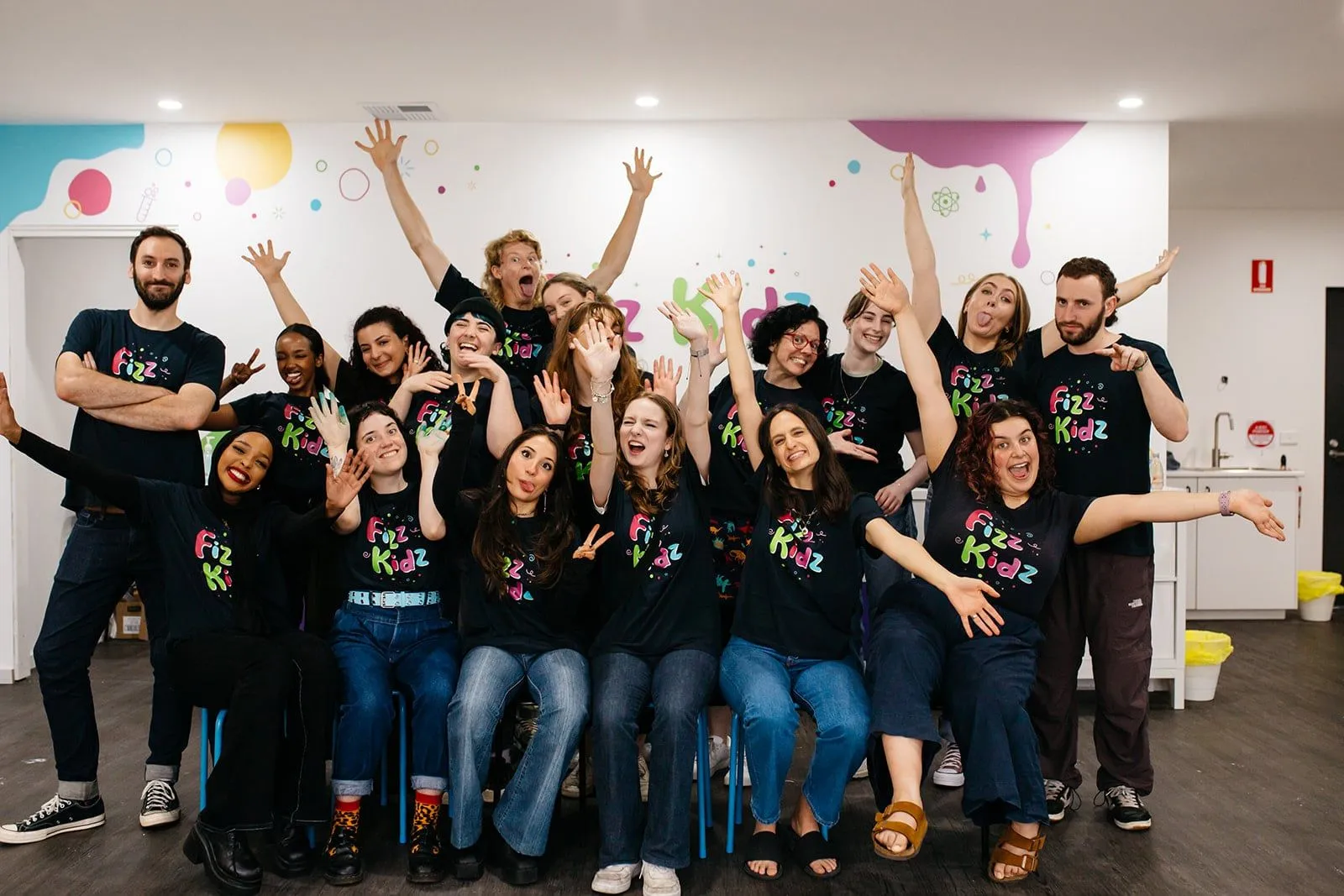 Many Fizz Kids staff all posing and laughing