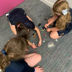 children experimenting with circuitry