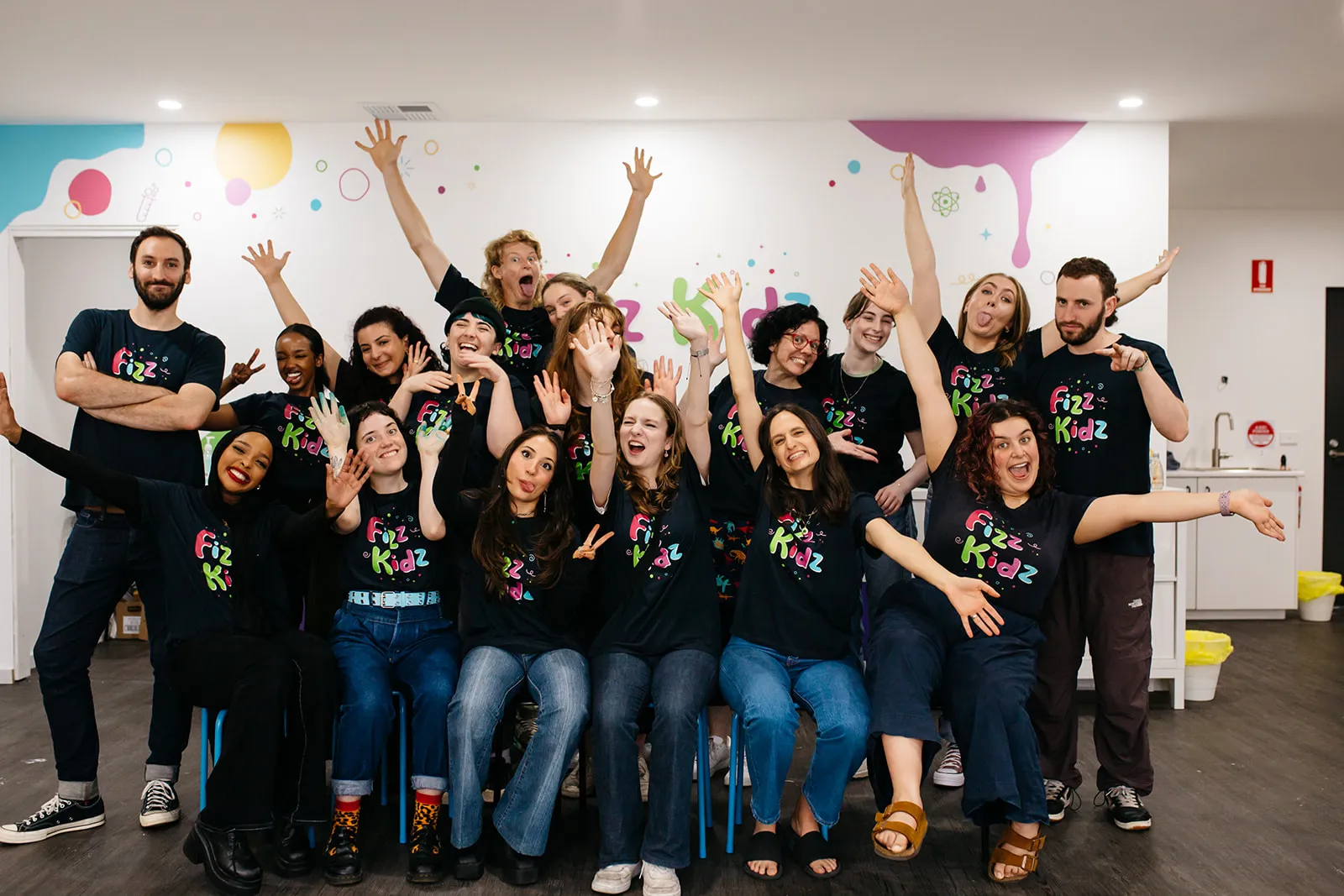 Many Fizz Kids staff all posing and laughing