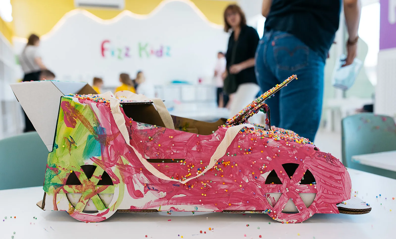 Child drawing during a Fizz Kidz learning activity