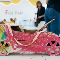 Child drawing during a Fizz Kidz learning activity