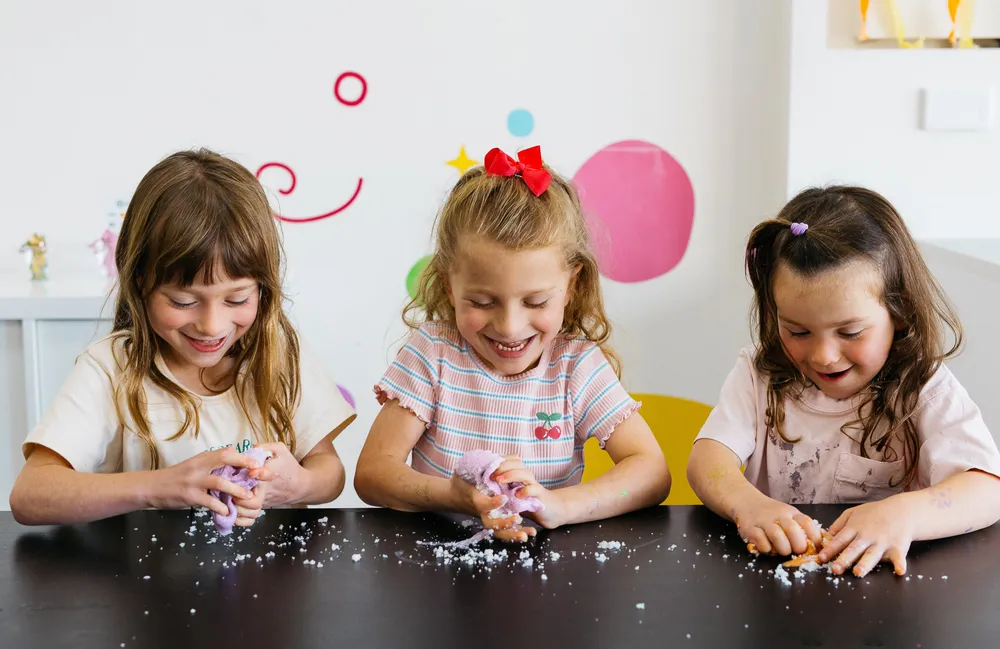 Kids holding slime
