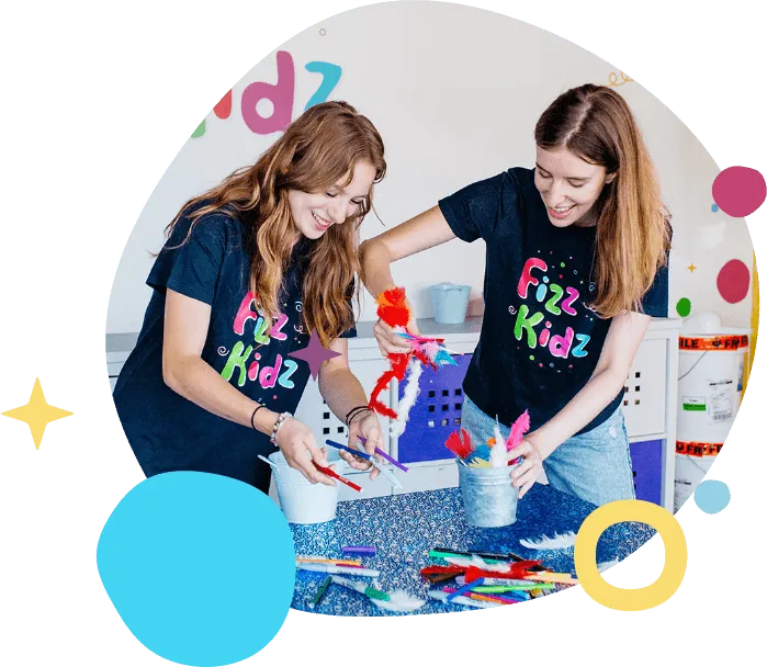 Fizz Kidz staff smiling and making slime