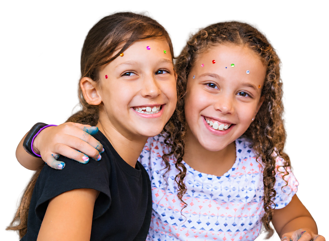 Two girls smiling together after a Fizz Kidz activity