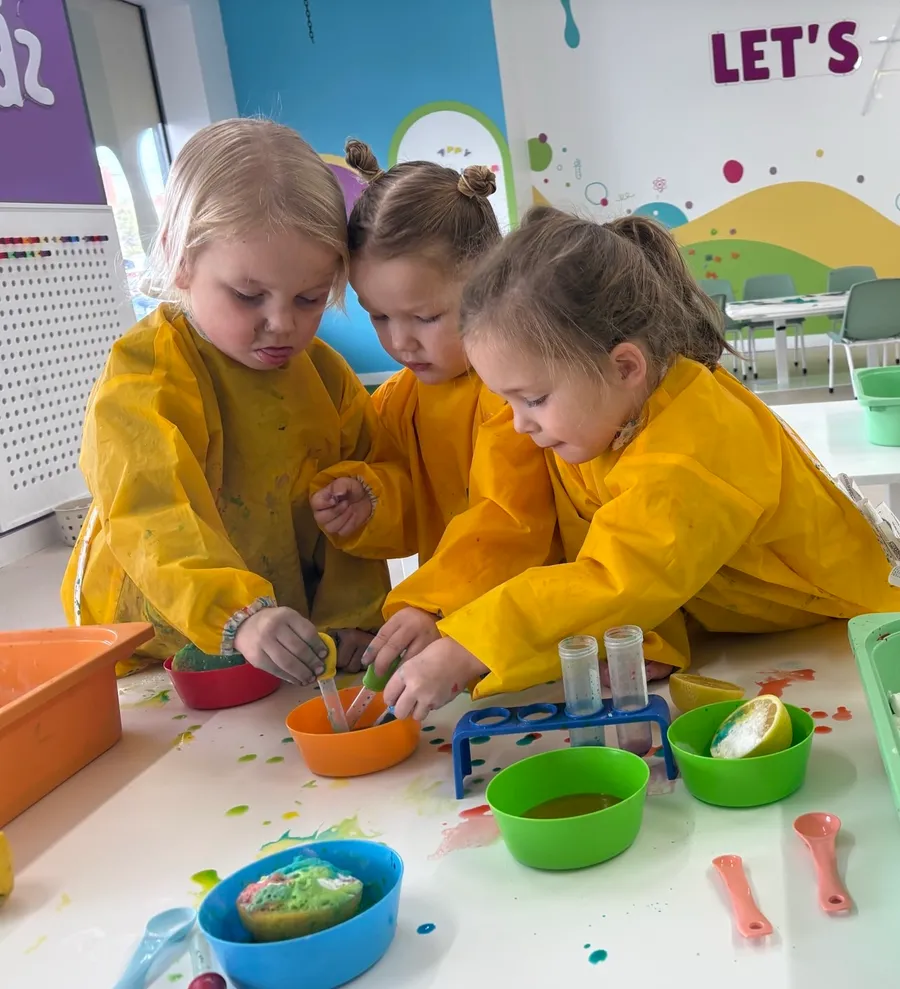 Child painting during a Preschool Program activity